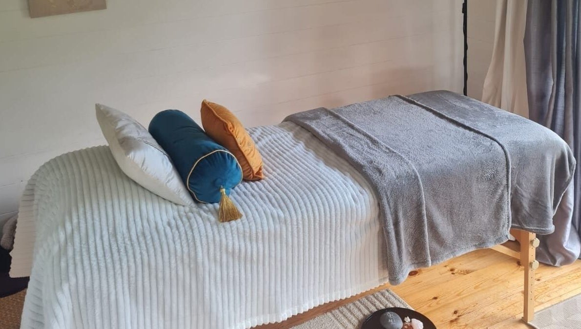 Elegant massage table at The Healing Room, Dublin, Dublin, IE, invites relaxation and wellness.