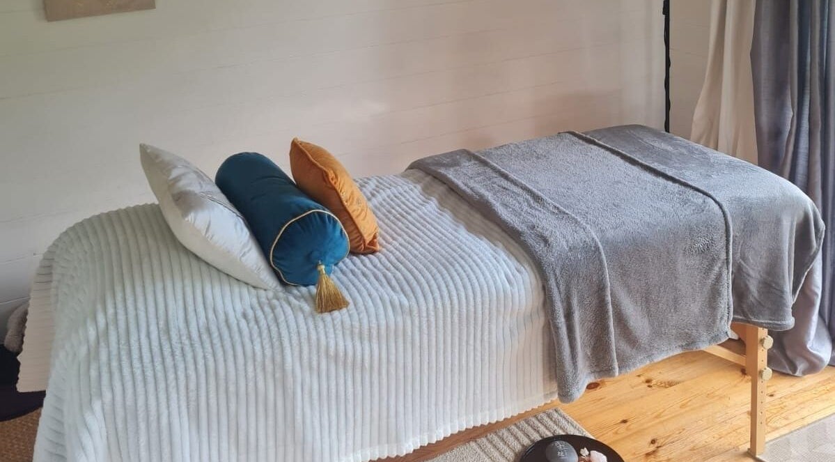 Elegant massage table at The Healing Room, Dublin, Dublin, IE, invites relaxation and wellness.