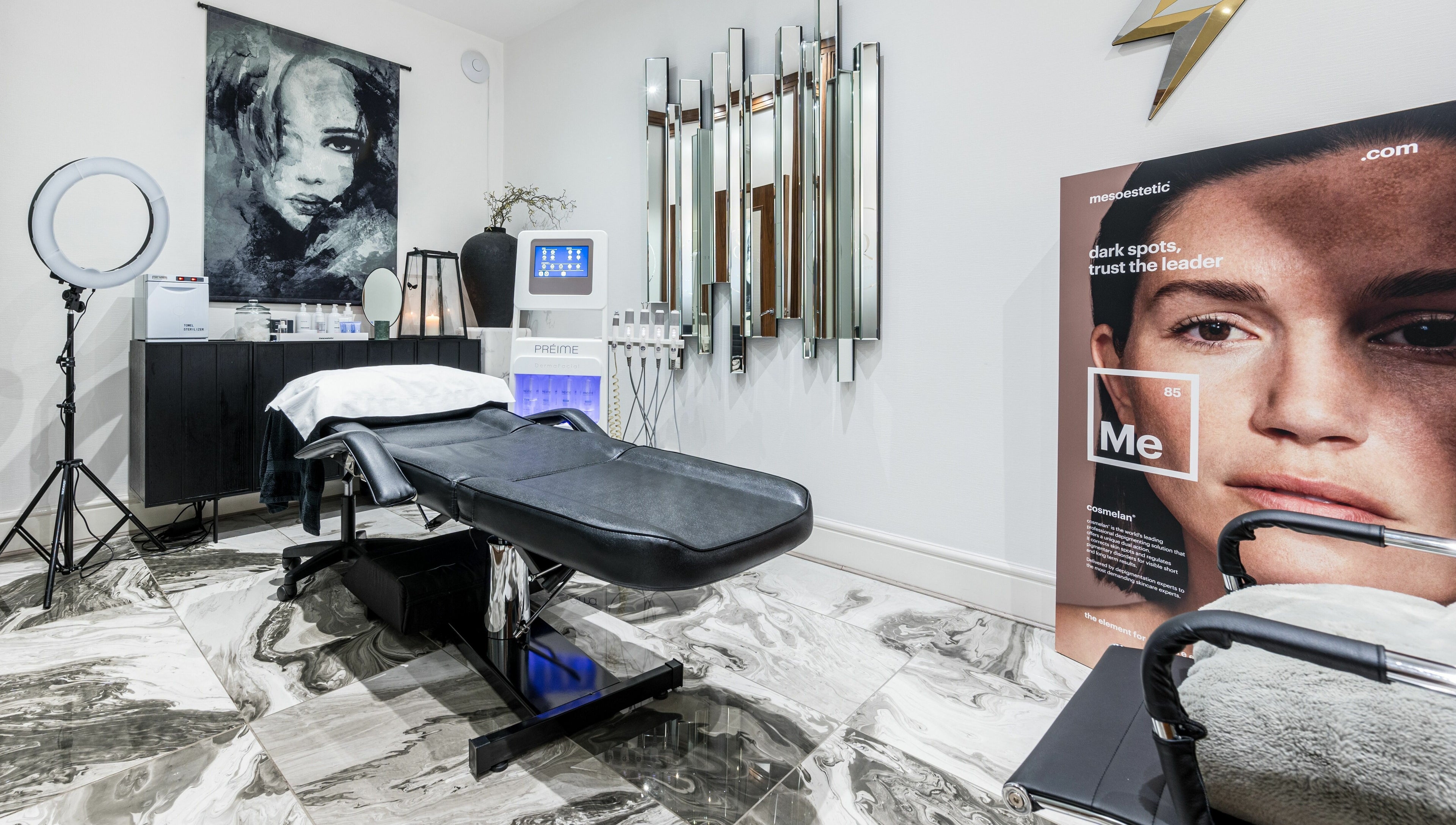 The Skin Quartz in Manchester, England, GB features a stylish treatment room with modern aesthetics.