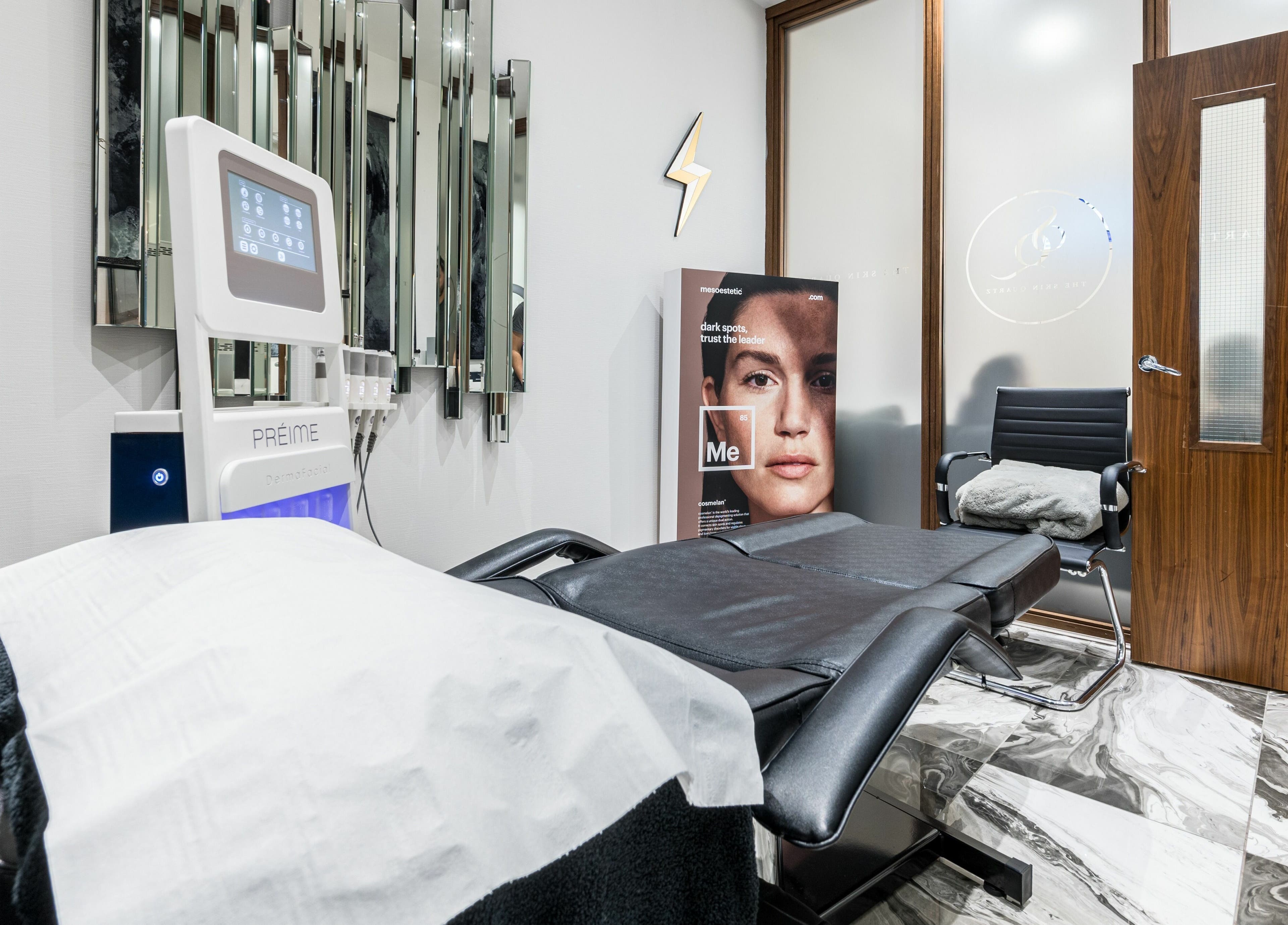 Calm and modern therapy room at The Skin Quartz, Manchester, England, GB, featuring advanced skincare equipment.