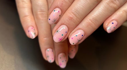 Elegant nail art with stars at Fiona Watton Beauty, Bude, England, GB, showcasing detailed manicure.