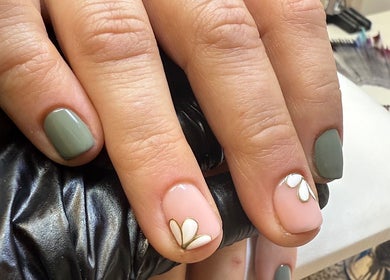 Manicure at Fiona Watton Beauty, Bude, England, GB, showcasing floral nail art design.