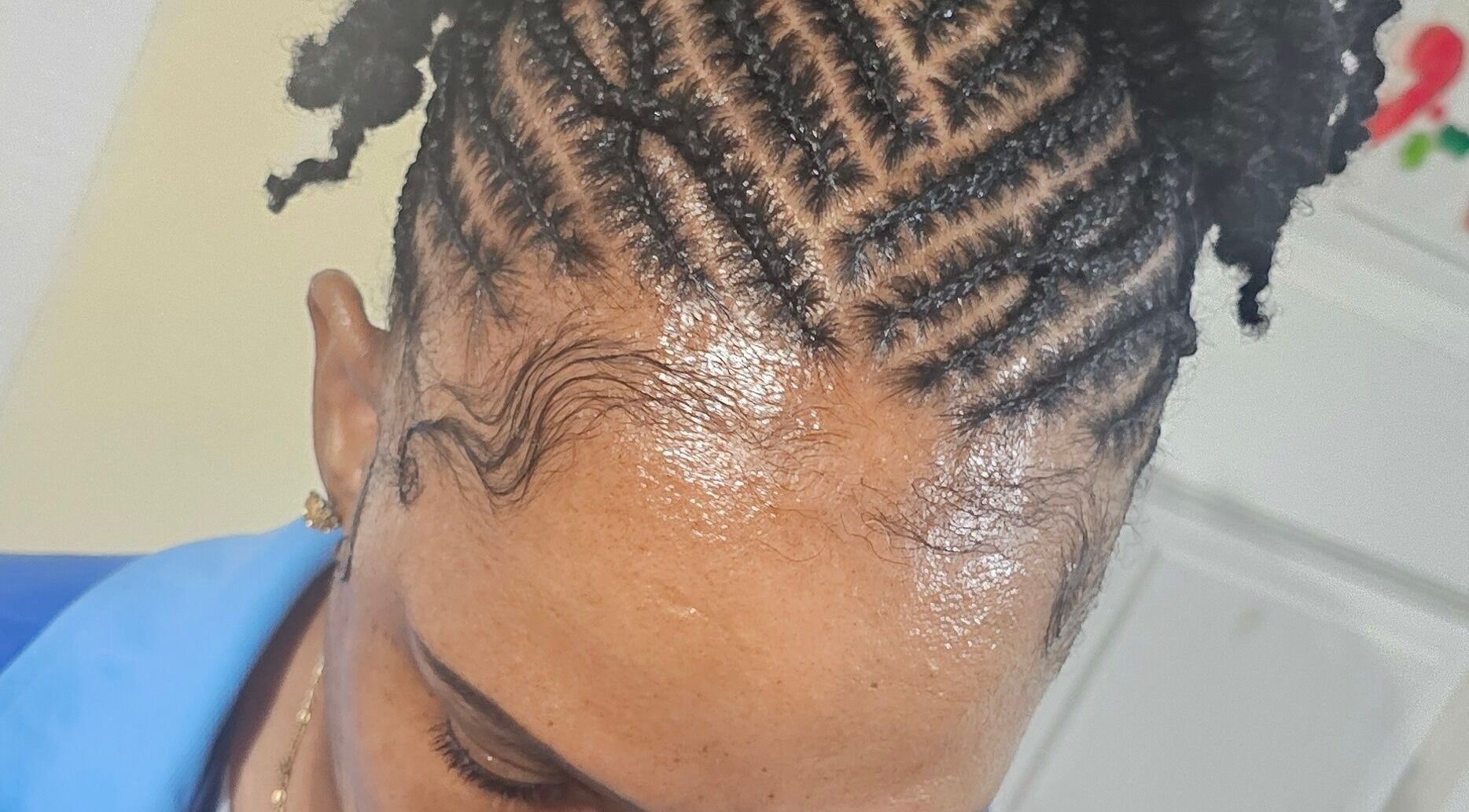 Detailed braided hairstyle at Zaphina Locs, Bridgetown, Saint Peter, BB, showcasing expert craftsmanship.