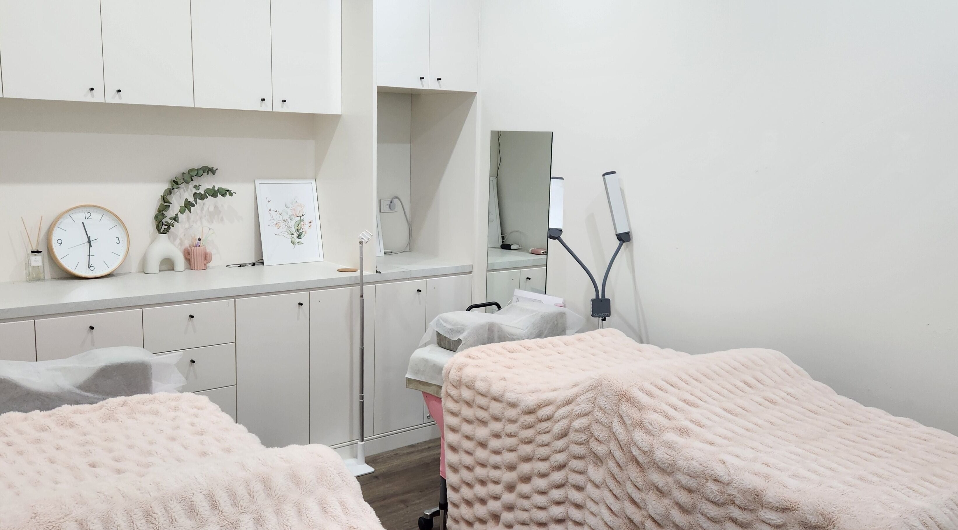 PUREGLAM BEAUTY tranquil room with soft pink blankets, Melbourne, Victoria, AU. Perfect for relaxation.