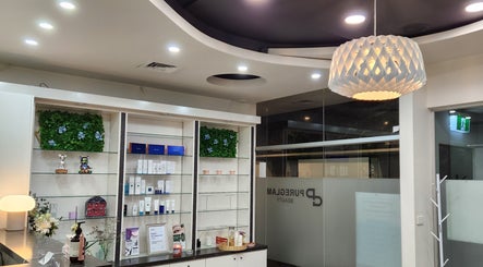 Chic interior of PUREGLAM BEAUTY in Melbourne, Victoria, AU featuring elegant decor and beauty product displays.
