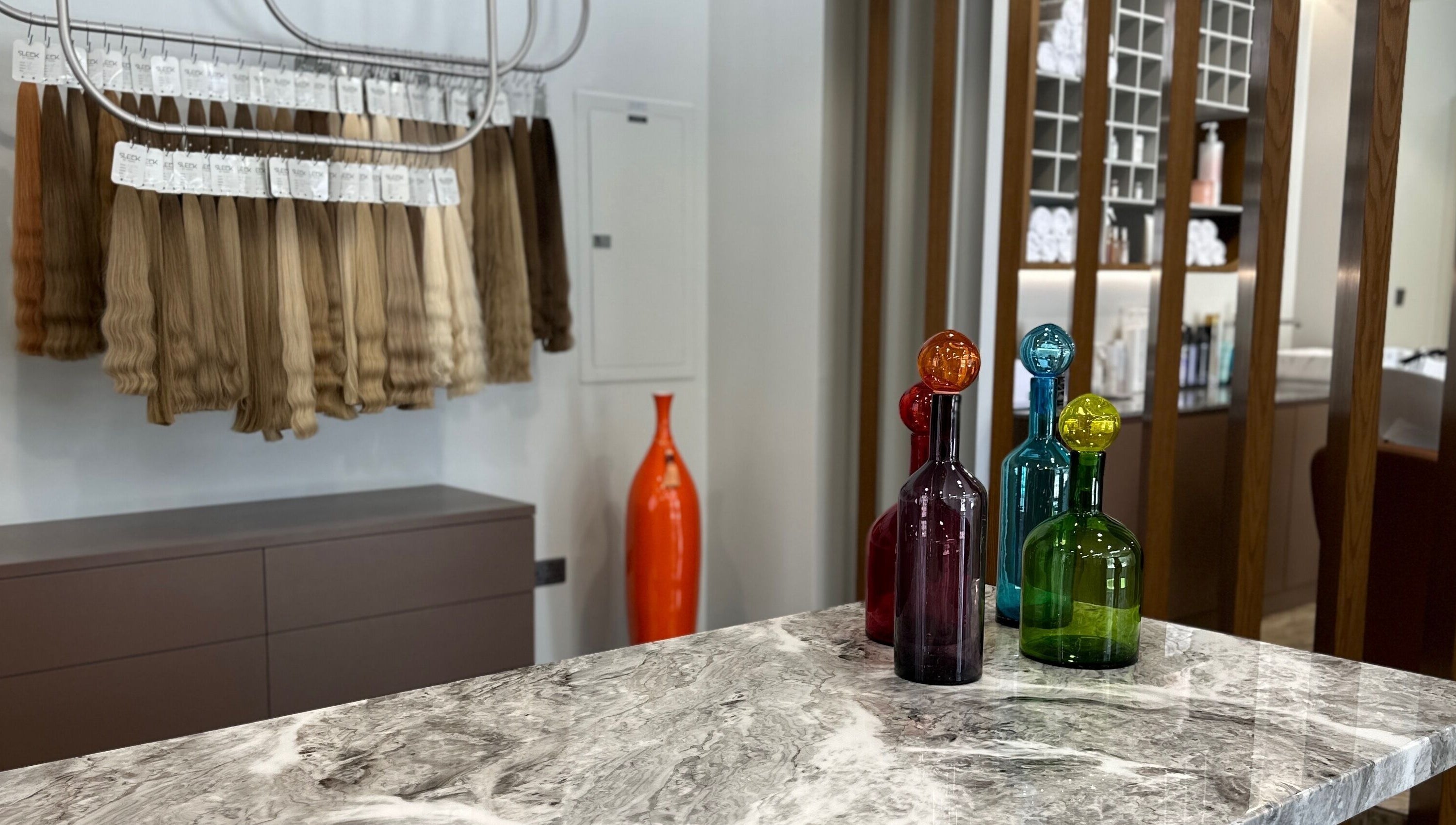 Stylish interior with hair extensions at Yana Grow My Hair, Dubai, Dubai, AE featuring colorful decor.