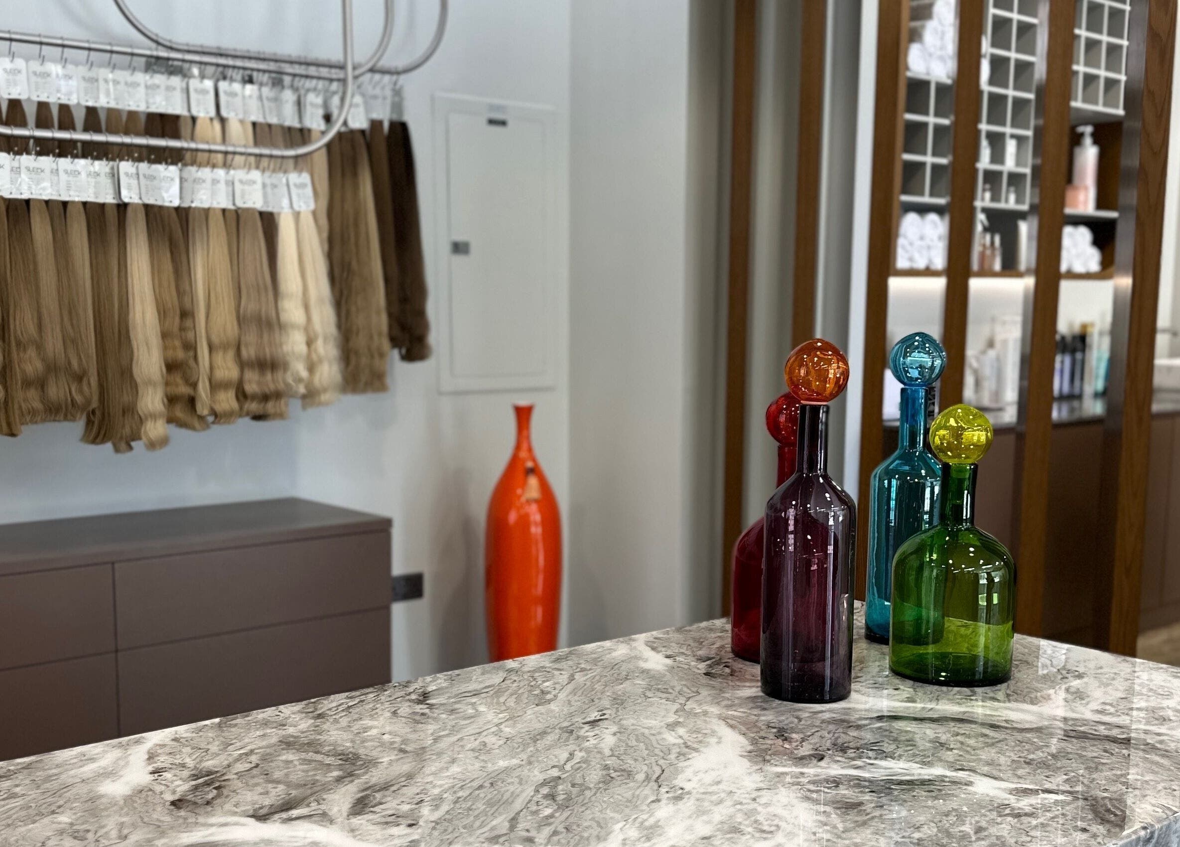 Stylish interior with hair extensions at Yana Grow My Hair, Dubai, Dubai, AE featuring colorful decor.