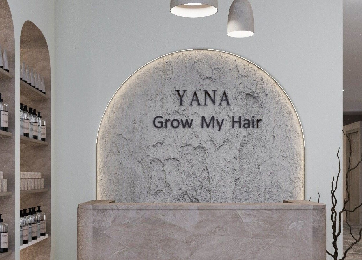 Entrance of Yana Grow My Hair in Dubai, Dubai, AE with elegant decor and product displays.