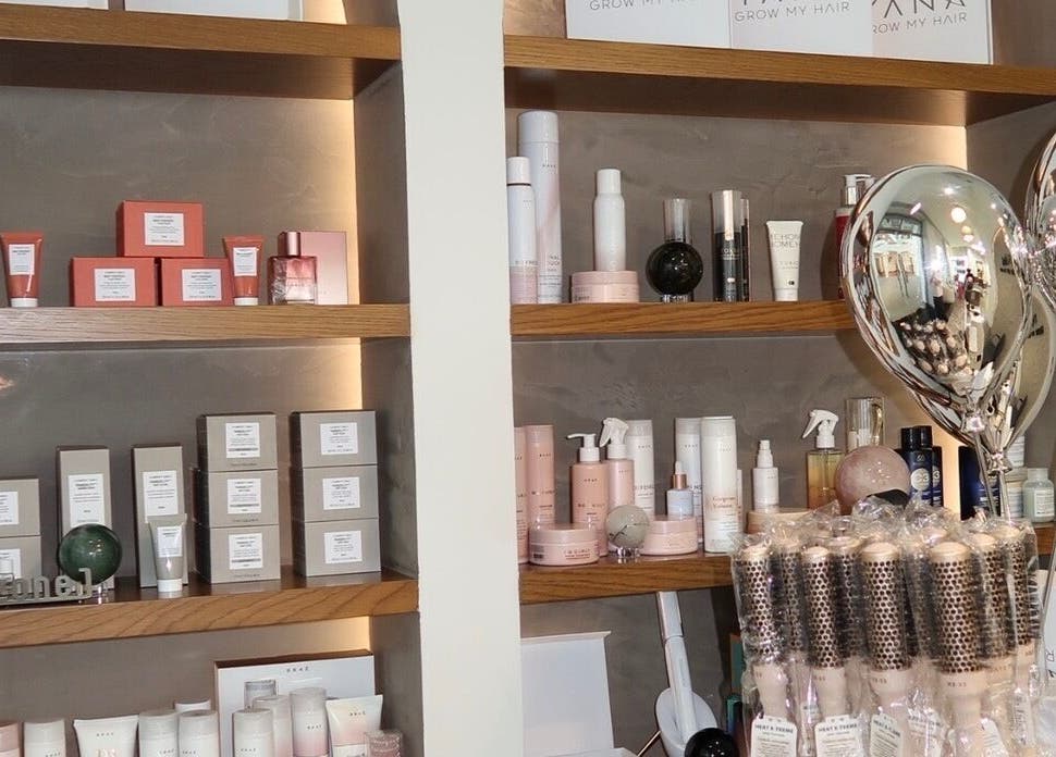 Display of beauty products at Yana Grow My Hair, Dubai, Dubai, AE, showcasing luxury hair and skincare items.