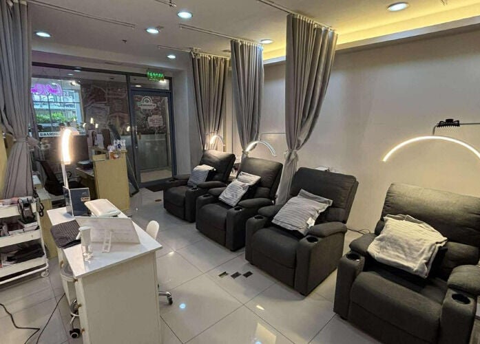 Cozy lounge chairs at PrimeLash - Taft Avenue Branch, Manila for ultimate relaxation and beauty treatments.