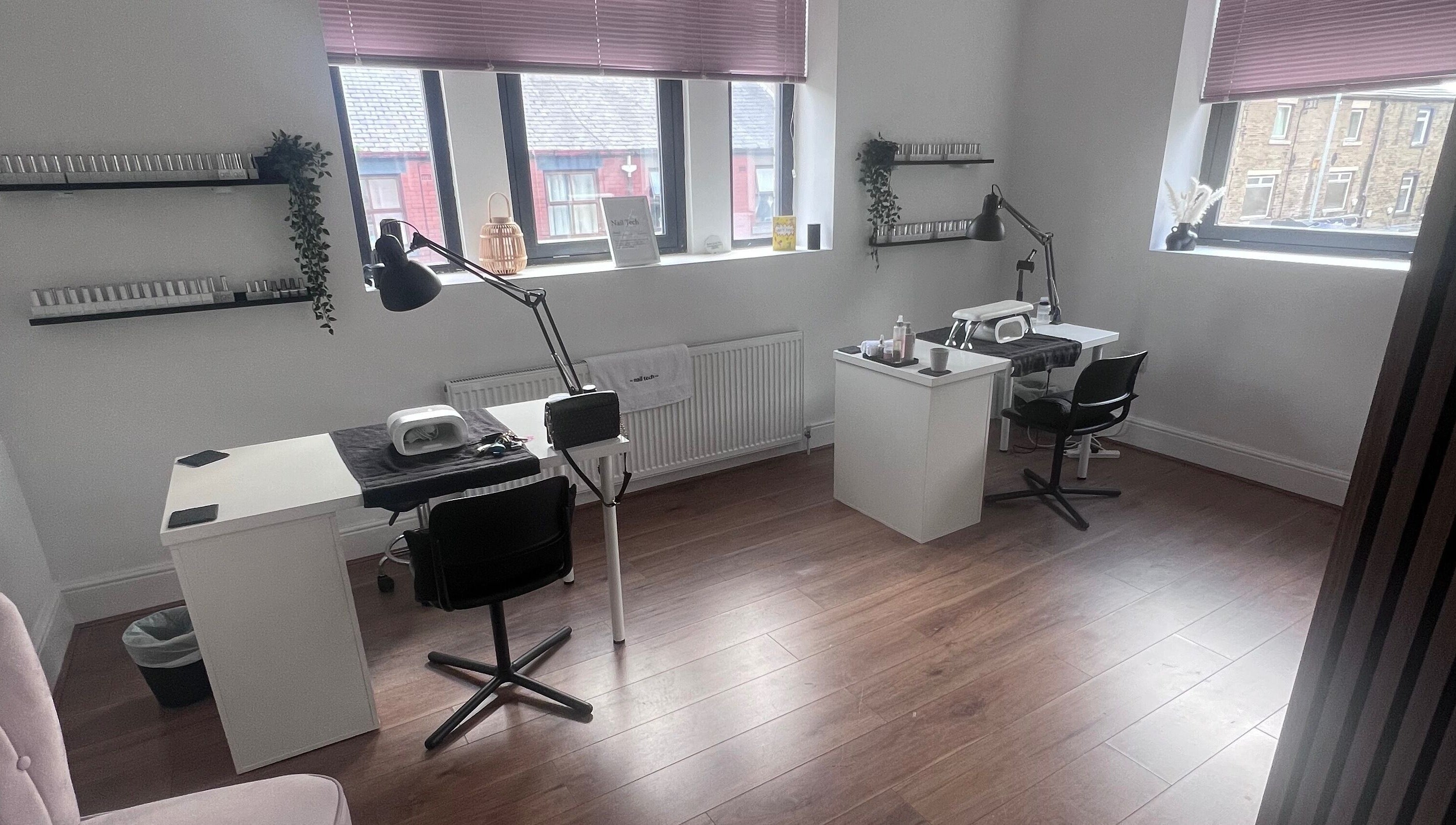 Modern nail stations at Cloudnine beauty studio in Milnrow, England, GB, offering a serene wellness experience.
