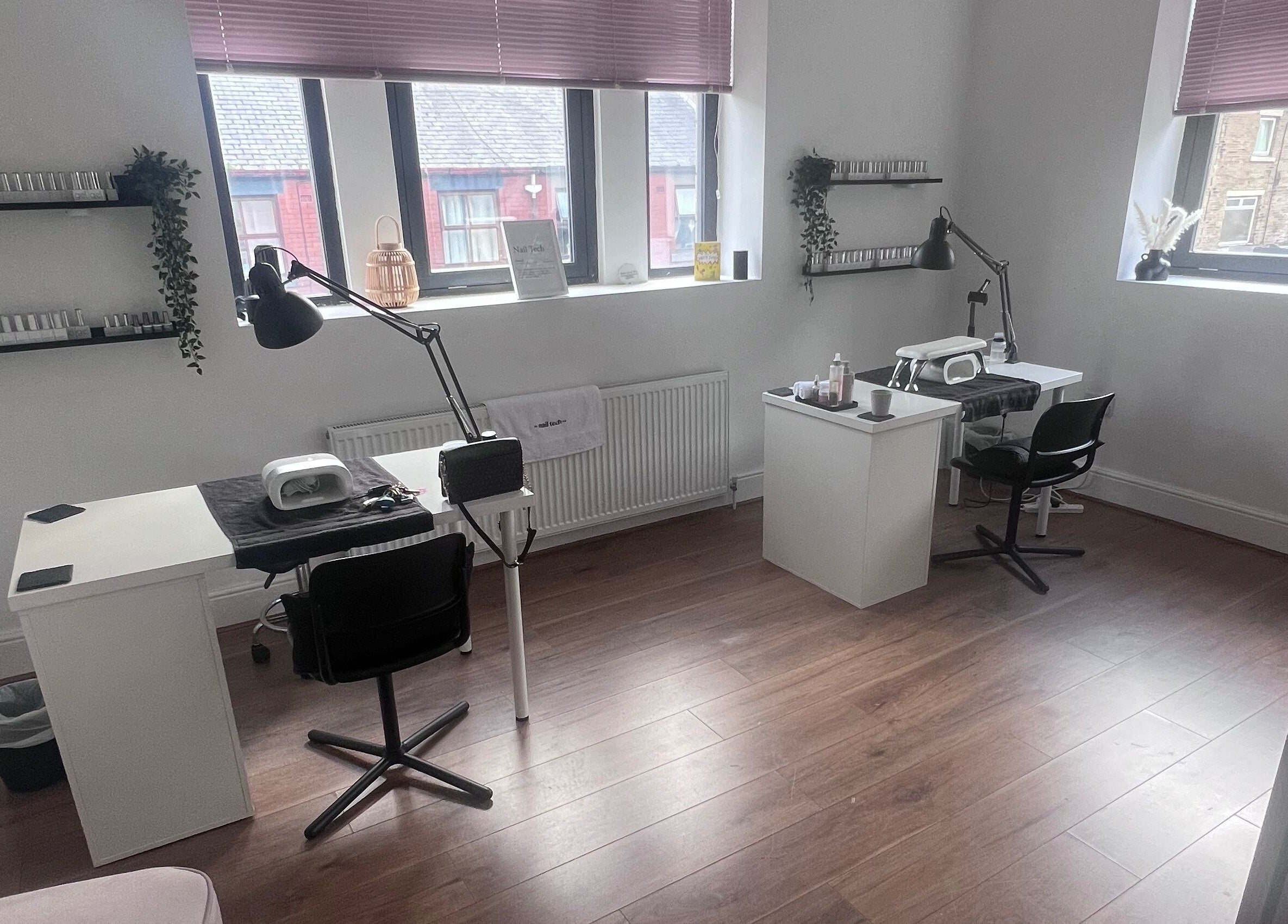 Modern nail stations at Cloudnine beauty studio in Milnrow, England, GB, offering a serene wellness experience.