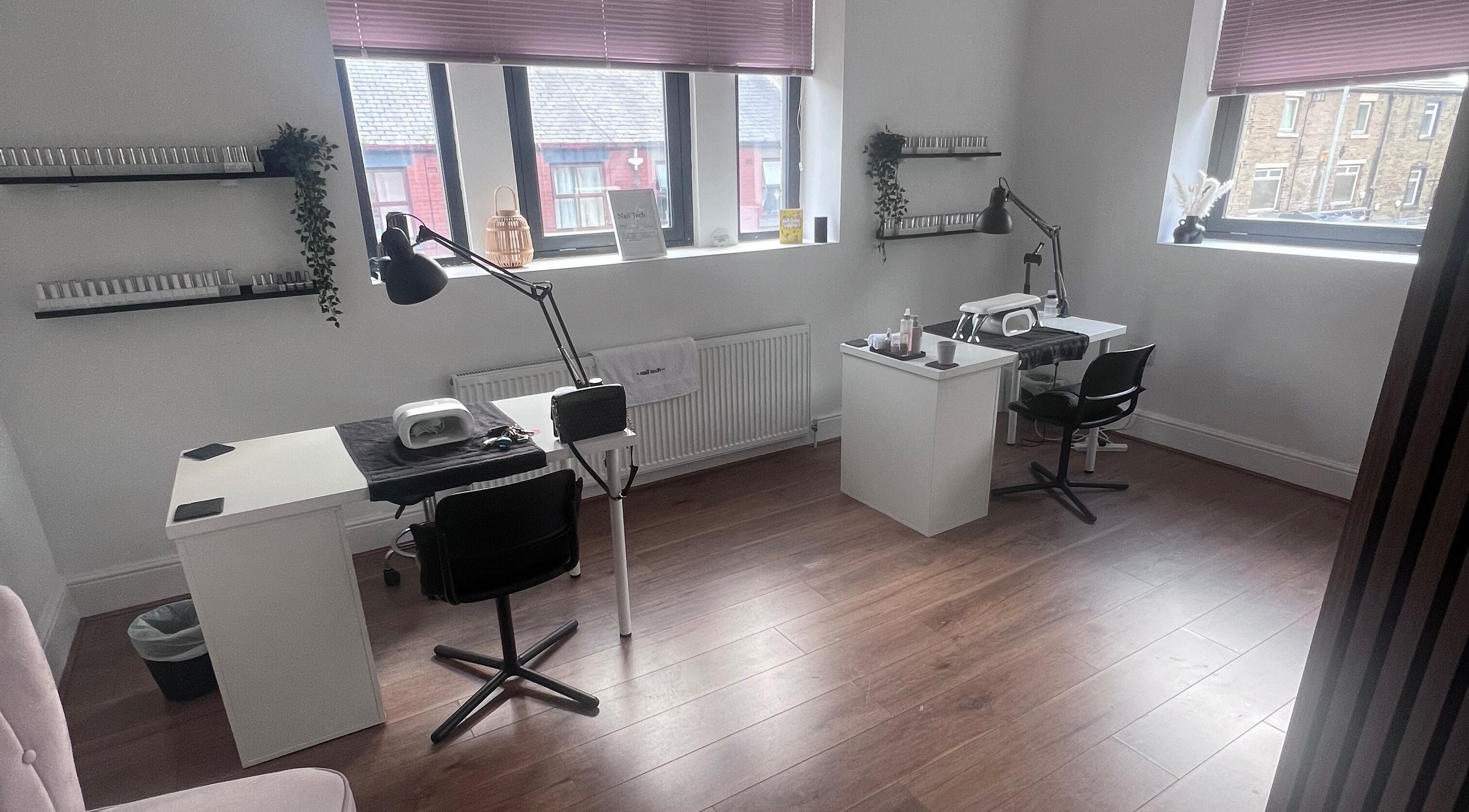 Modern nail stations at Cloudnine beauty studio in Milnrow, England, GB, offering a serene wellness experience.