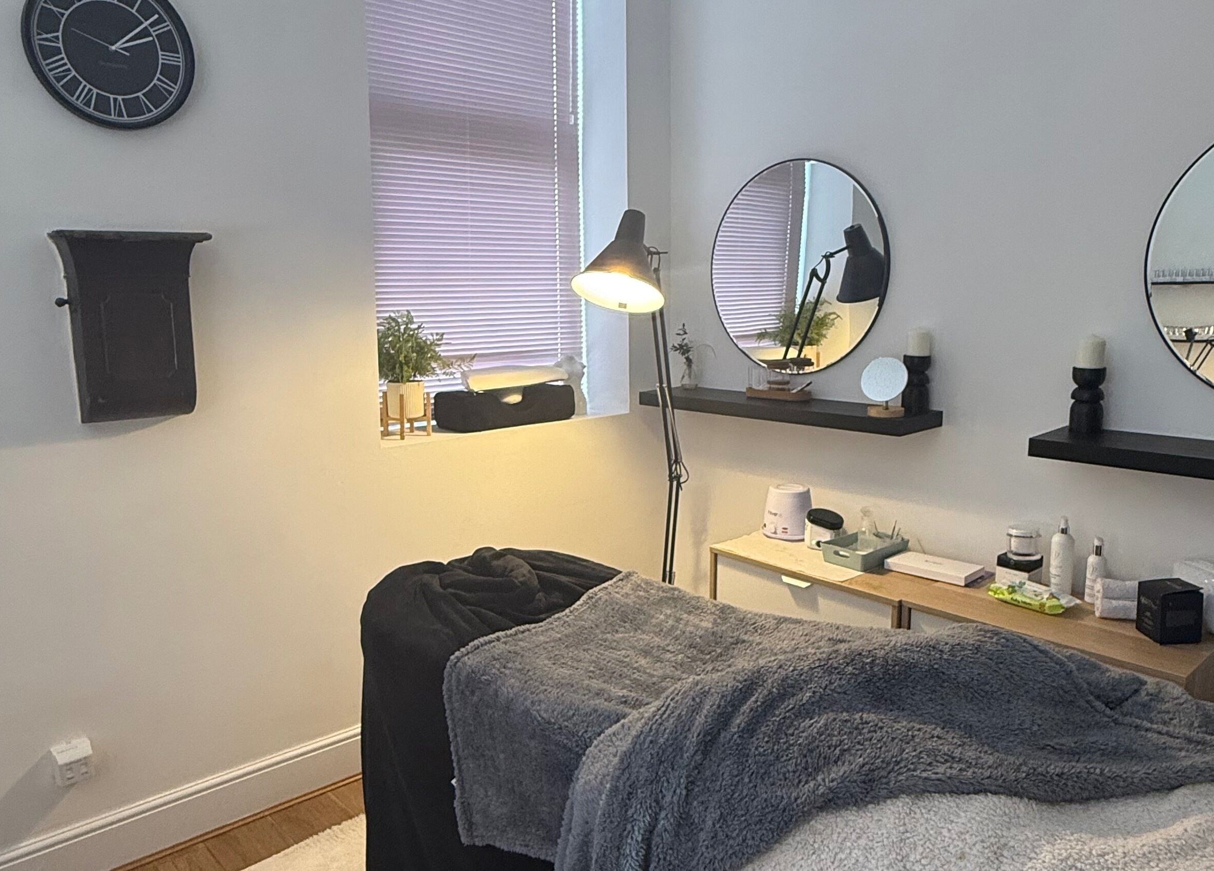 Relaxing treatment room at Cloudnine beauty studio in Milnrow, England, GB with soothing decor and gentle lighting.