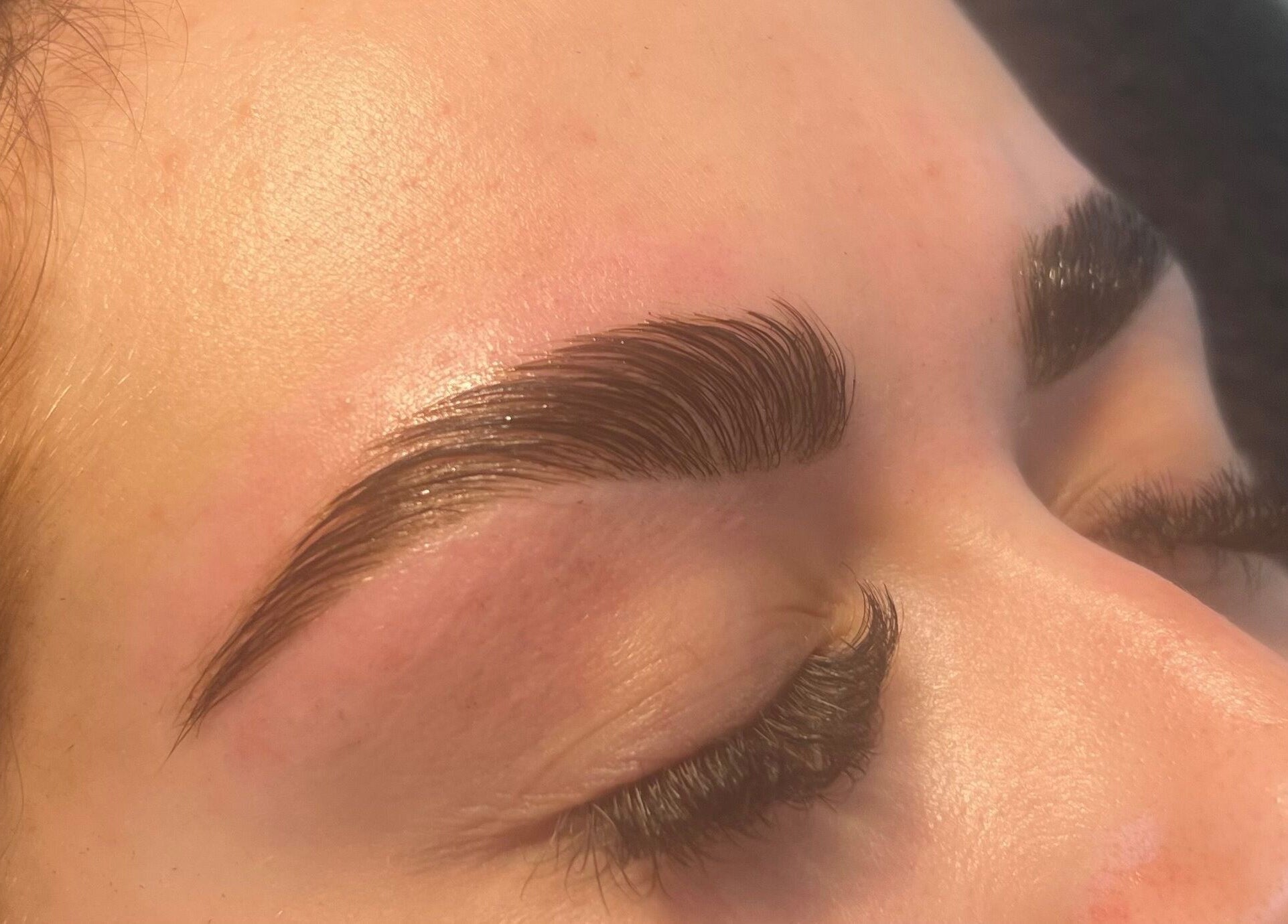 Close-up of expertly styled eyebrows at Cloudnine beauty studio, Milnrow, England, GB.