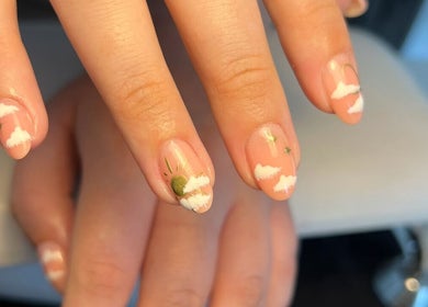Cloudnine beauty studio in Milnrow, England offers artistic cloud-themed nail designs.