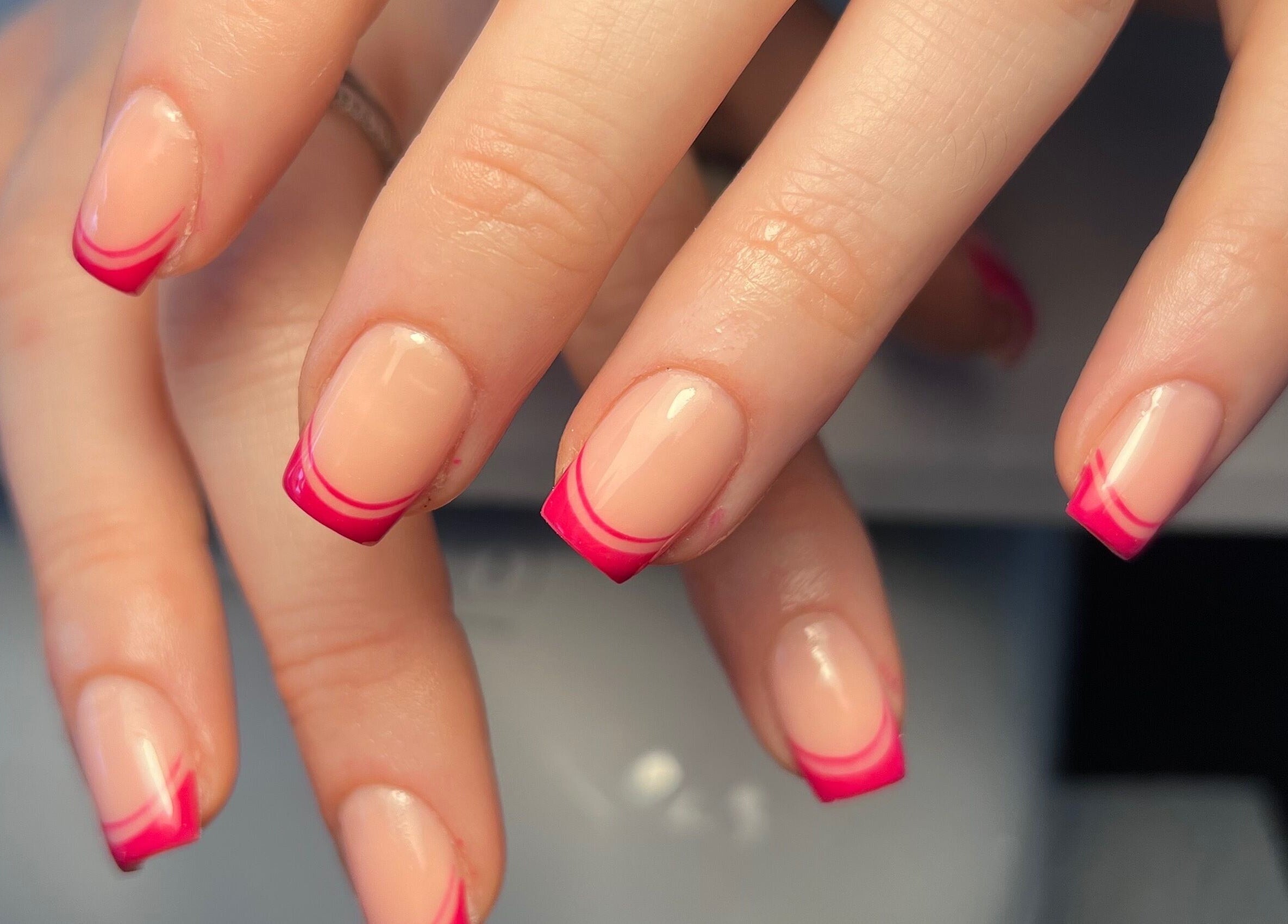 Stylish pink French manicure at Cloudnine beauty studio, Milnrow, England, GB.
