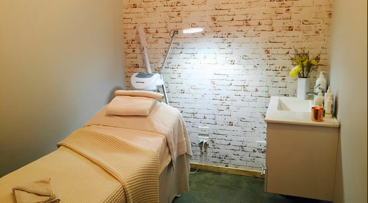Cozy treatment room at Etticutt Hair Skin Body in Kenmore, Queensland, AU with gentle lighting and calming decor.
