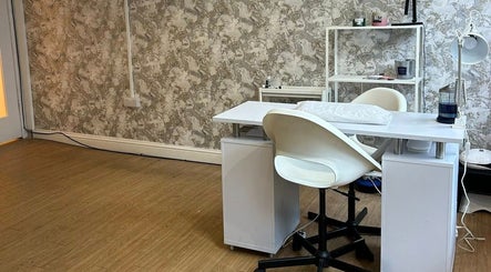 Modern nail station at Elevate in Ripon, England, GB, featuring stylish decor and comfortable seating.