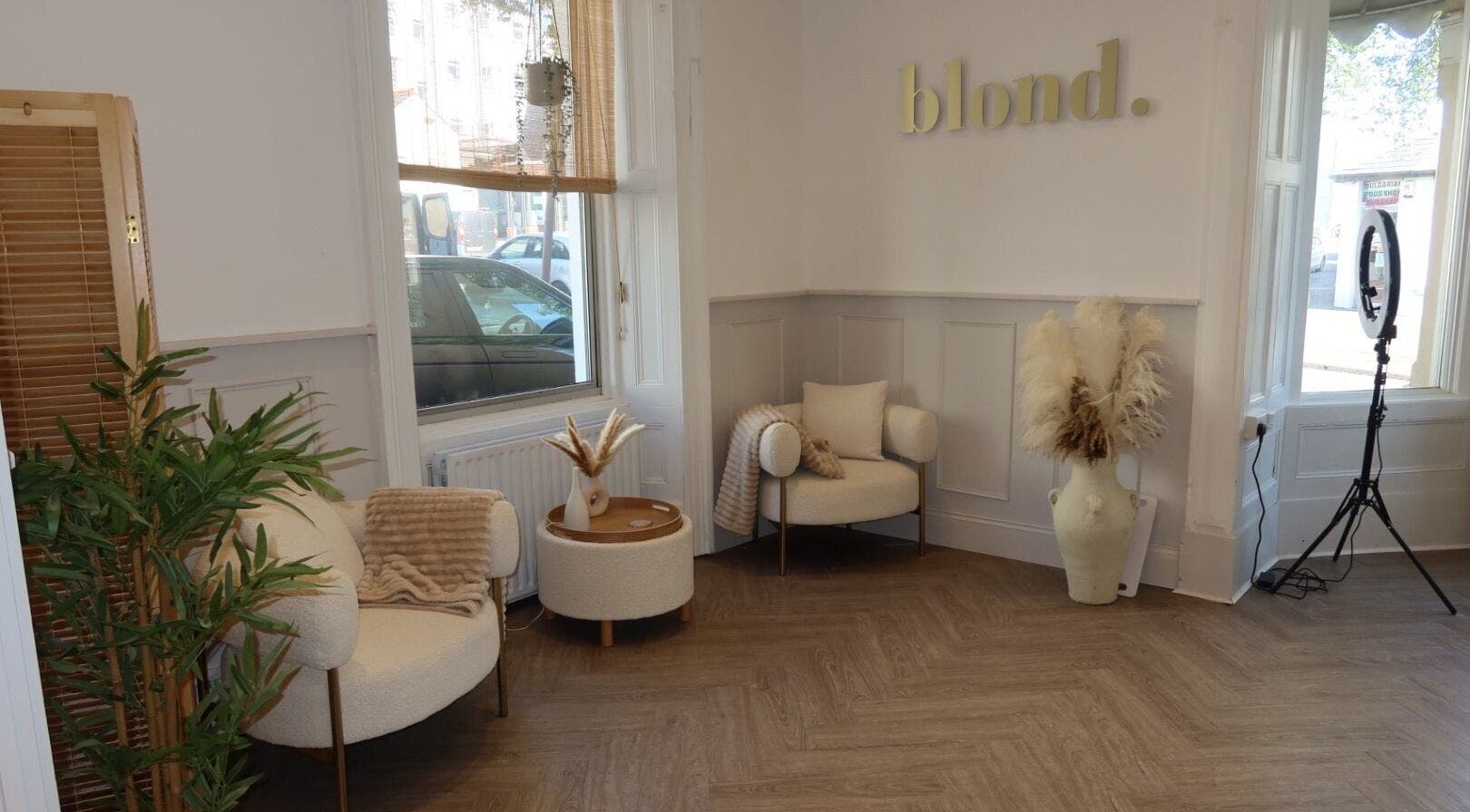 Elegant seating area at Blond., Douglas, Douglas, IM with modern decor and natural light.
