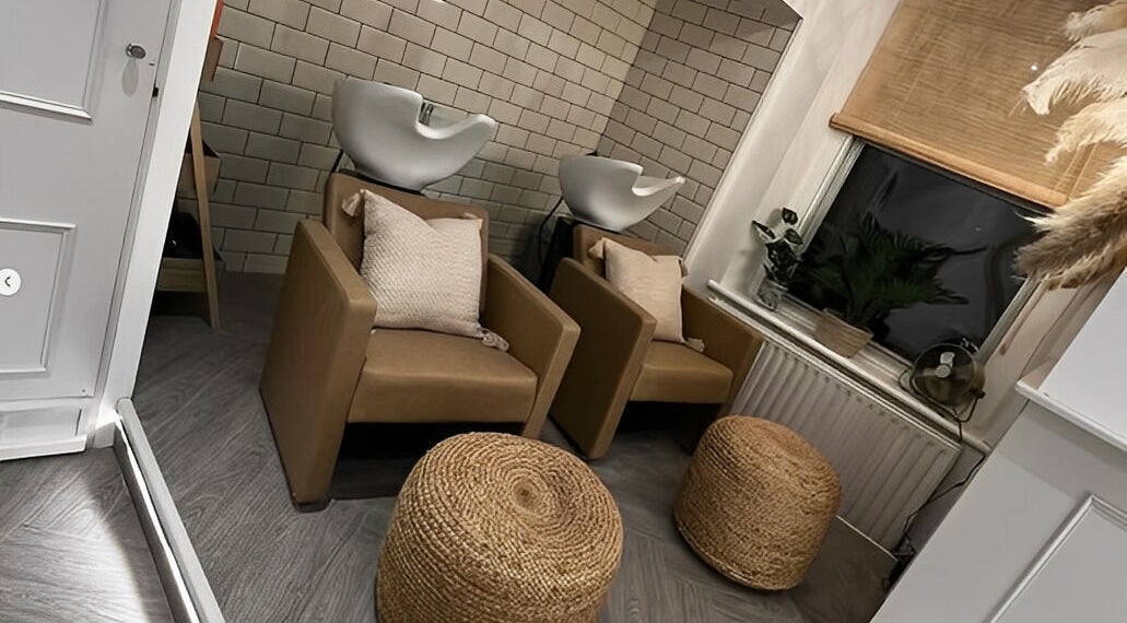 Cozy salon seating at Blond. in Douglas, Douglas, IM with stylish wash stations and natural decor.