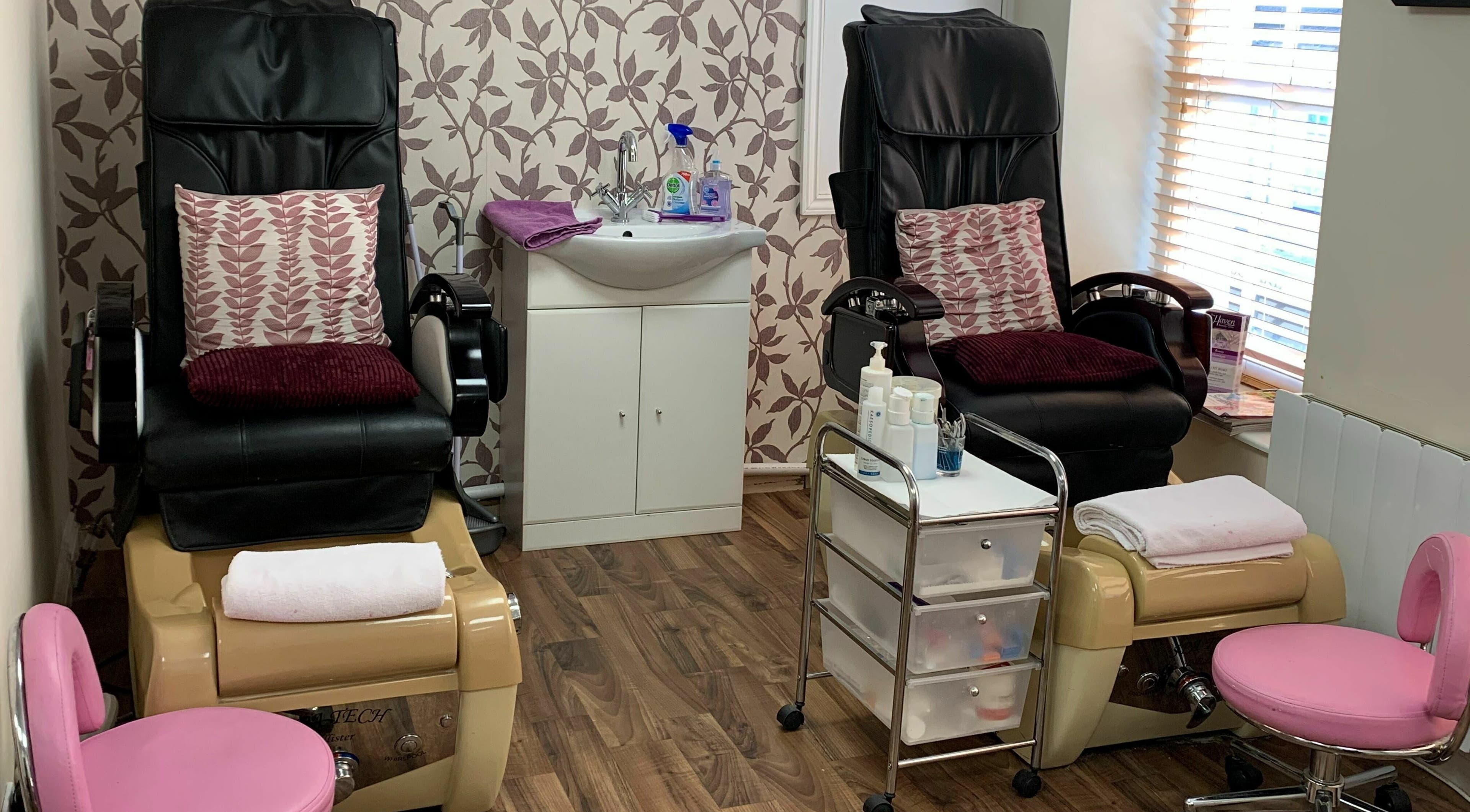 Relaxing pedicure chairs at The Haven Beauty Clinic, Daventry, England, GB, with plush cushions and chic decor.