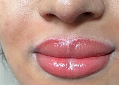 Close-up of glossy lips service at Pure Nine Beauty, Birmingham, England, GB.