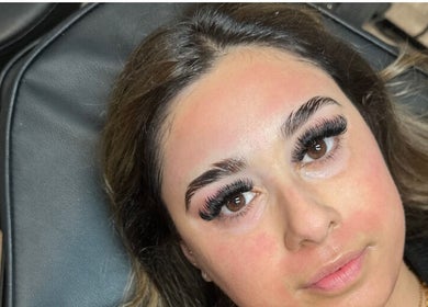 Close-up of a woman's enhanced lashes at Pure Nine Beauty, Birmingham, England, GB.