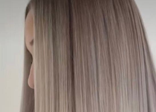 Long, sleek silver hair styled at CHiLL CULT by Santana Lantuch, London, England, GB.