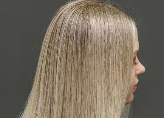 Side view of silky blonde hair at CHiLL CULT by Santana Lantuch, London, England, GB.