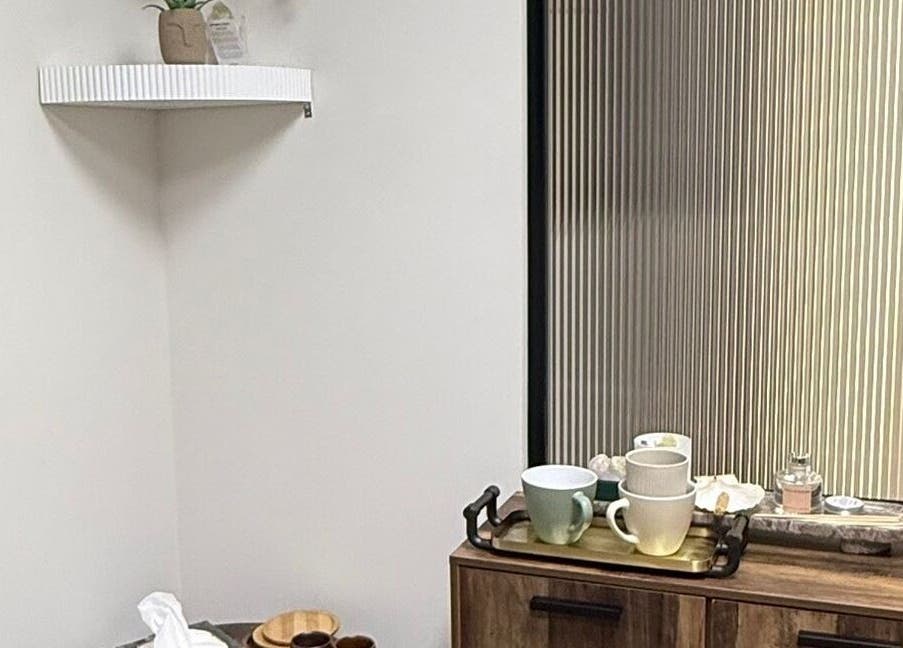 A cozy refreshment station at CHiLL CULT by Santana Lantuch, London, England, GB, with cups and decorative items.