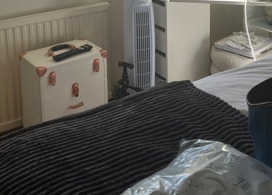 Chic interior at Maison de Maya, Basildon, England, GB, featuring stylish storage options and a cozy aesthetic.