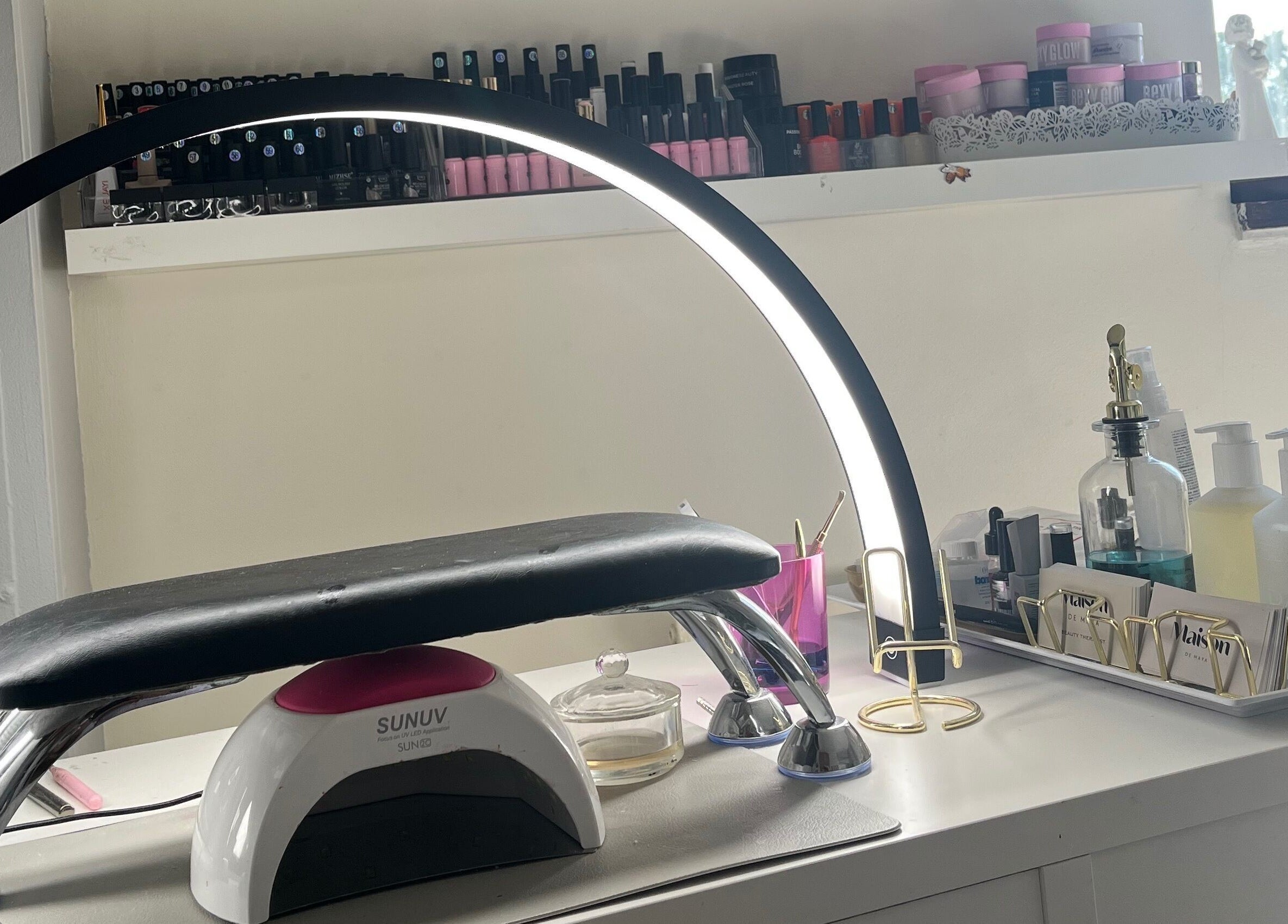 Elegant nail care setup at Maison de Maya in Basildon, England, GB showcasing manicure tools and products.