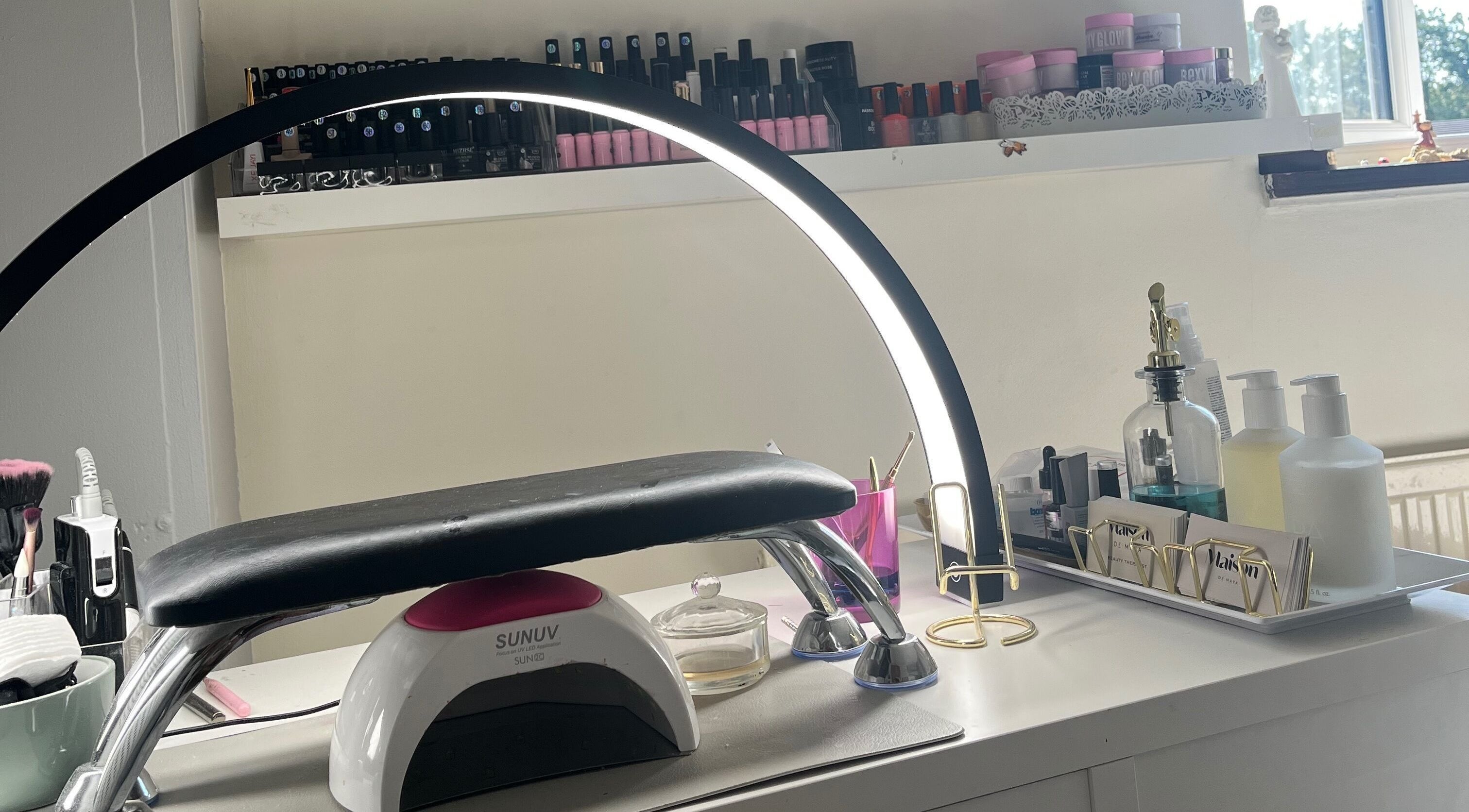 Elegant nail care setup at Maison de Maya in Basildon, England, GB showcasing manicure tools and products.