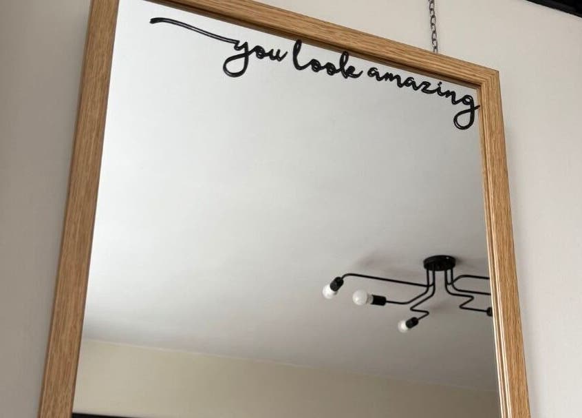 Elegant mirror with 'you look amazing' at Twenty Two Beauty and Training, Ripley, England, GB.