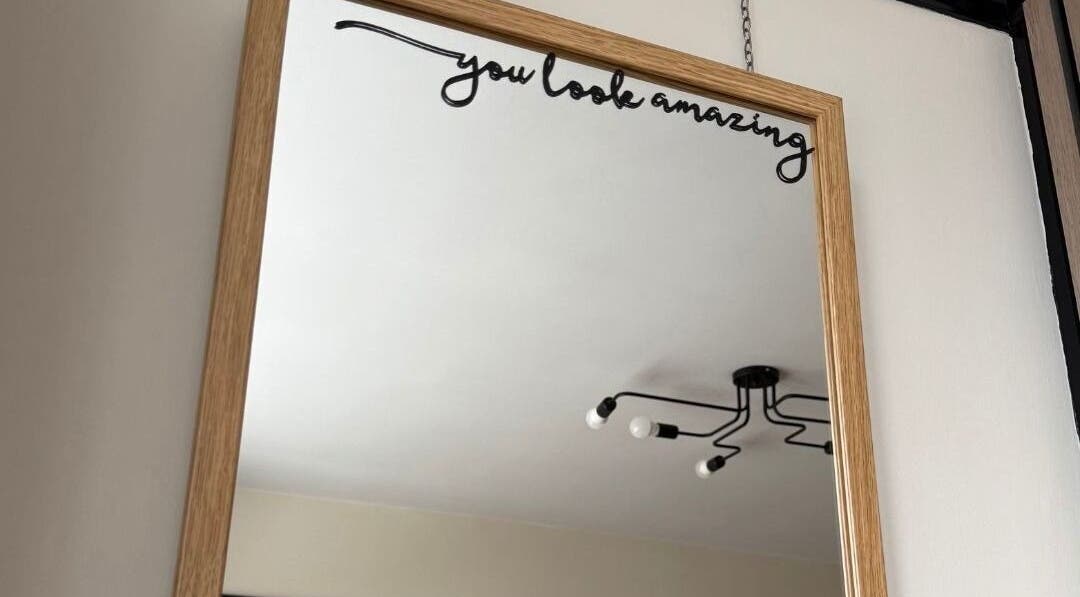 Elegant mirror with 'you look amazing' at Twenty Two Beauty and Training, Ripley, England, GB.
