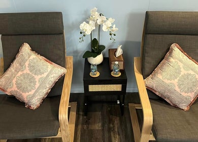 Comfy chairs with orchid at 88 Thai Massage Studio, Richmond, Victoria, AU.