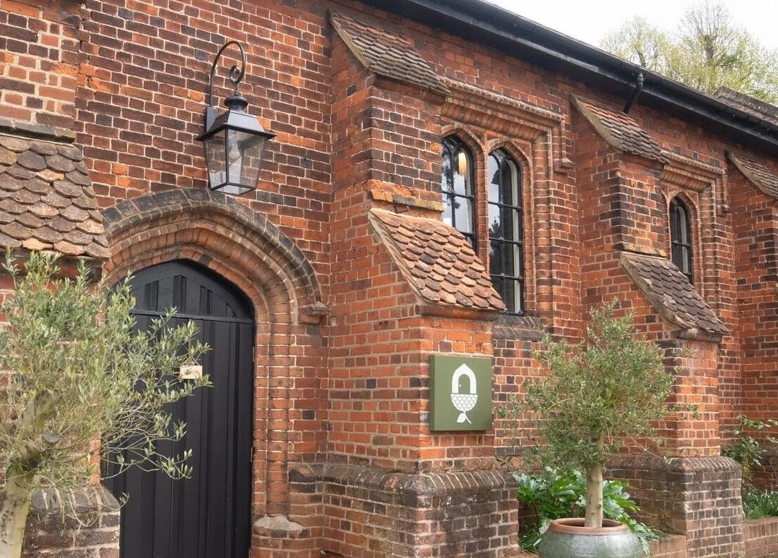 The charming brick exterior of Rejuvenate by Janka The Oak House studio, located in Hatfield, England, GB.
