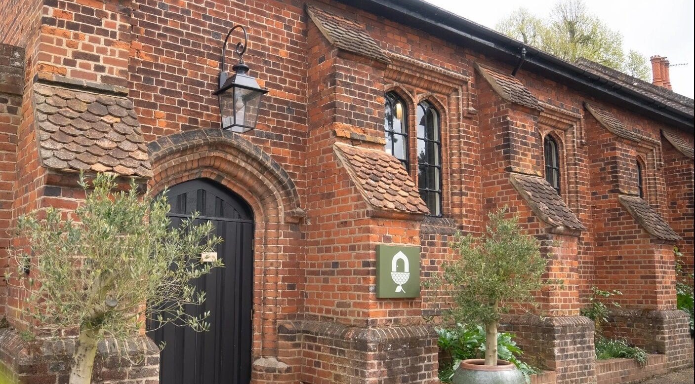 The charming brick exterior of Rejuvenate by Janka The Oak House studio, located in Hatfield, England, GB.