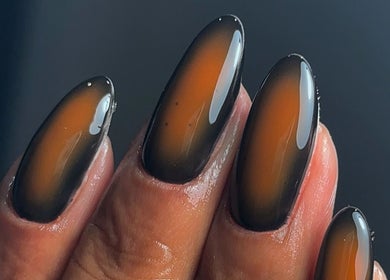 Elegant amber-toned nails at Trinity Nail Studio, Willenhall, England, GB stunningly highlighted.