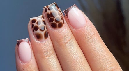 Stylish animal print nails at Trinity Nail Studio in Willenhall, England, GB, showcasing expert nail artistry.