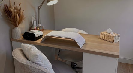 Cozy nail station at Trinity Nail Studio in Willenhall, England, GB with modern decor and equipment.