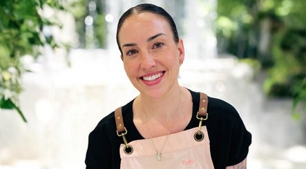Smiling staff member at Exhale Holistic Skin, Bentleigh East, Victoria, AU promotes welcoming ambiance.