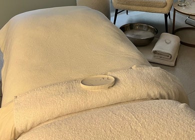 Tranquil treatment bed at Exhale Holistic Skin, Bentleigh East, Victoria, AU, showcasing relaxation and comfort.