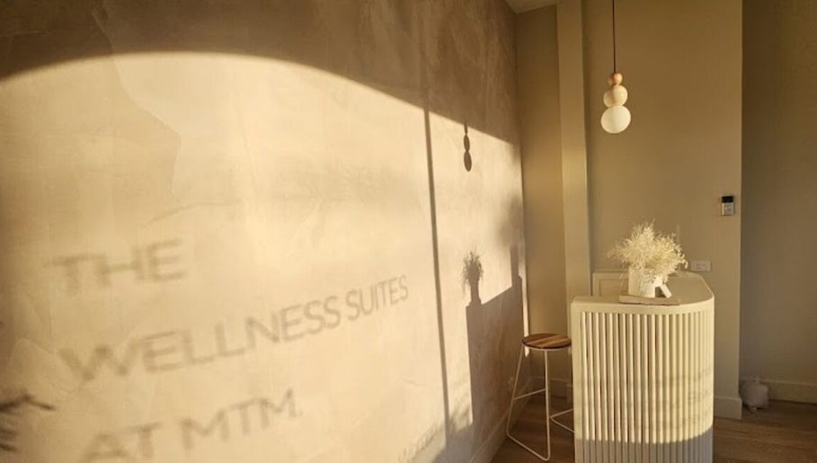 Calm and inviting corner at Exhale Holistic Skin, Bentleigh East, Victoria, AU, with soft sunlight and decor.