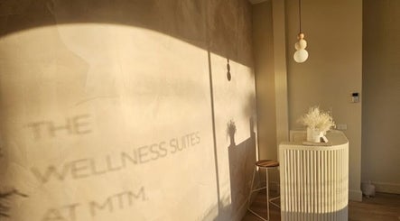 Calm and inviting corner at Exhale Holistic Skin, Bentleigh East, Victoria, AU, with soft sunlight and decor.