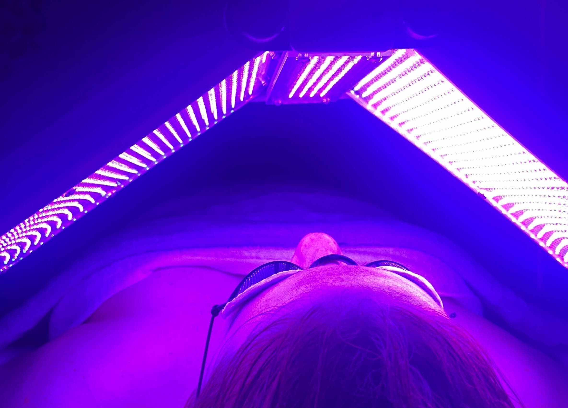 LED therapy session at Exhale Holistic Skin, Bentleigh East, Victoria, AU. Enhancing skin health under violet light.