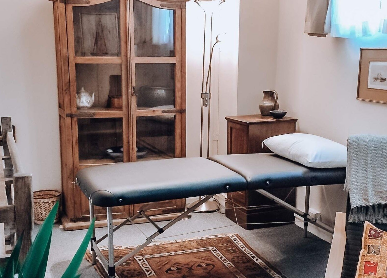 Serene treatment room at Colette Osteopathy at The Practice Rooms, Bristol, England, GB with massage table.
