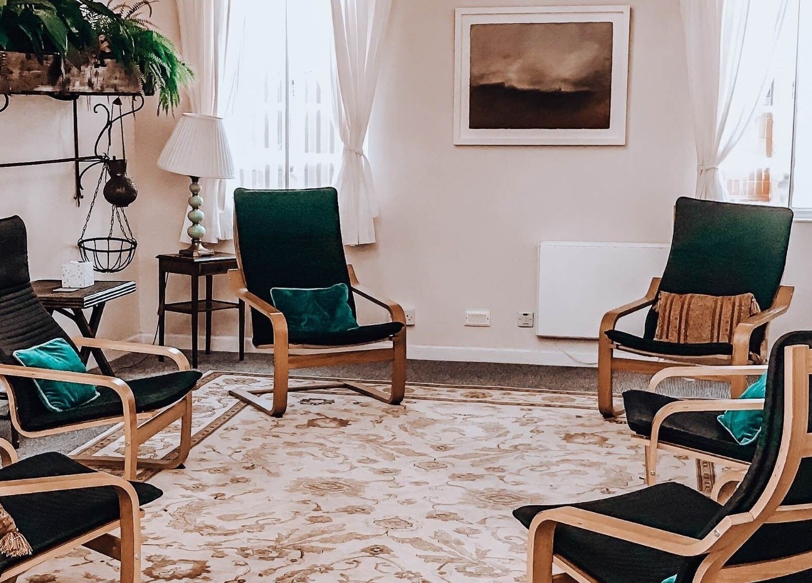 Colette Osteopathy at The Practice Rooms features a calming lounge in Bristol, England, GB, with elegant decor.