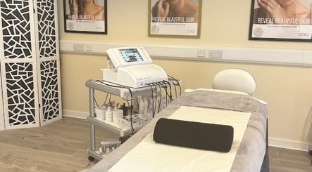 Christol Beauty spa room in Douglas, Isle of Man, GB, featuring a massage table and skincare equipment.